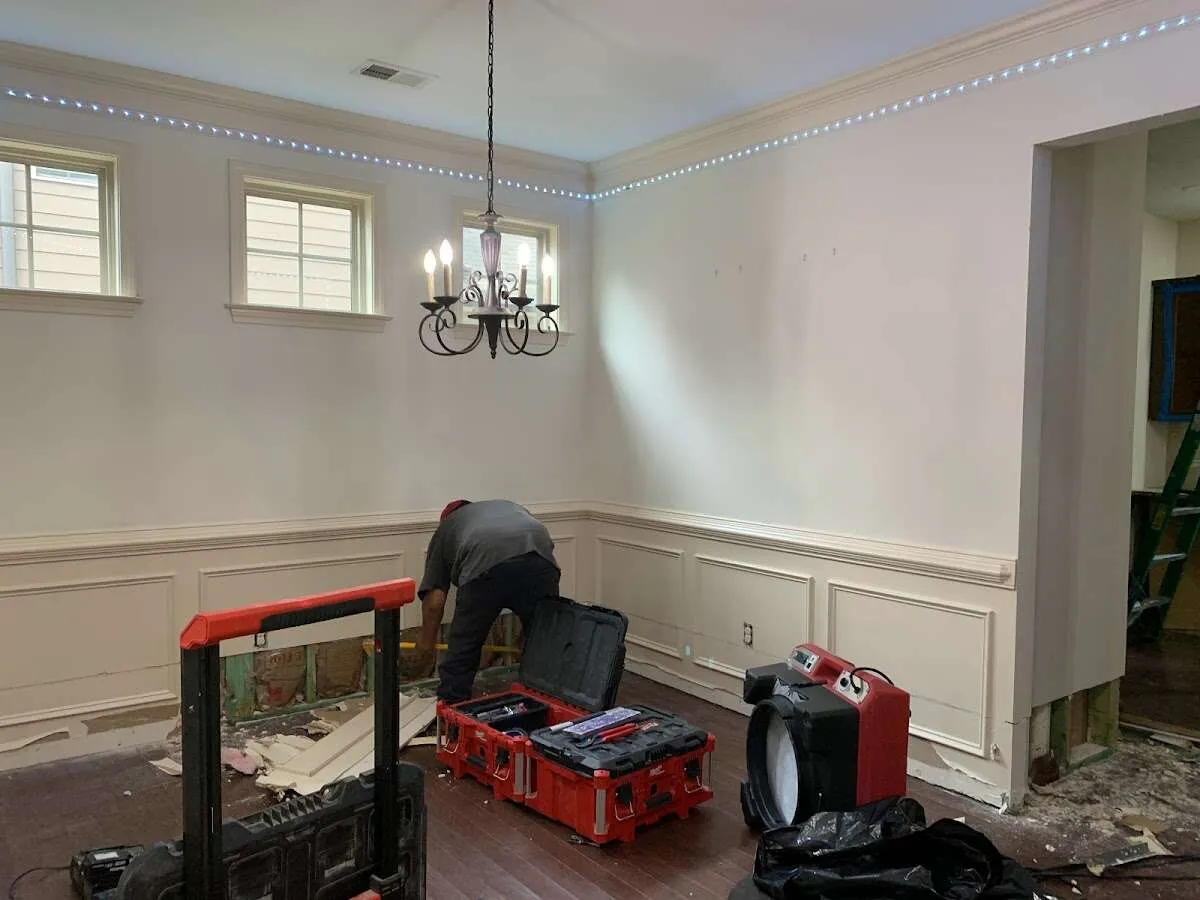 Restoration technician with professional equipment in Essex Junction